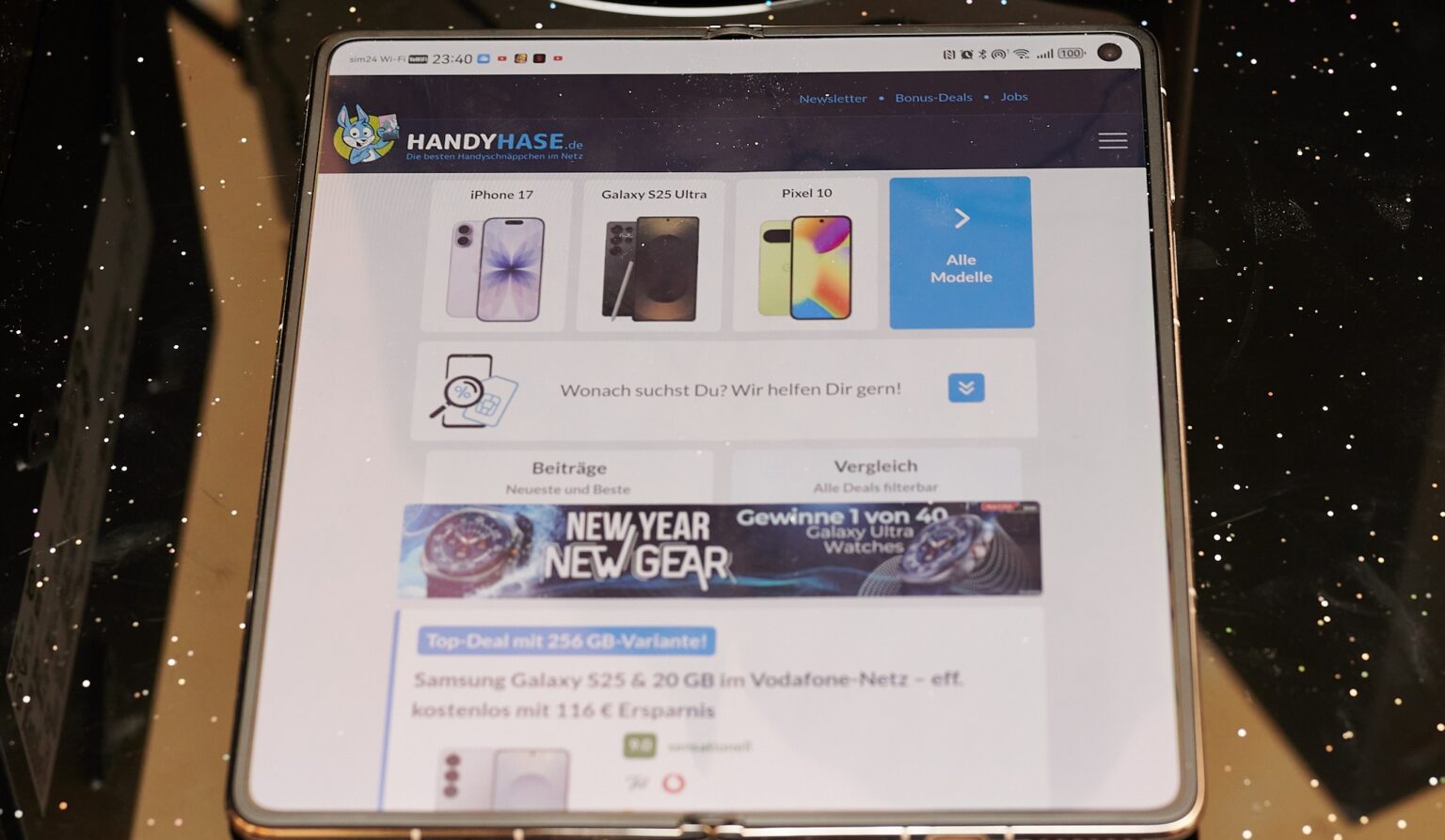 geöffnetes X7 mit Handyhase-Webseite.